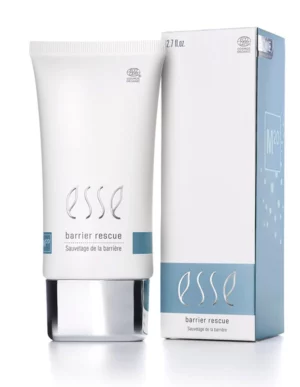 A white 2.7 fl oz tube labeled “Esse Barrier Rescue” stands beside its matching box, both adorned with blue and silver accents and featuring the description “Sauvetege de la barrière.”.